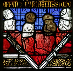 Fenster mit Darstellung der Seelen im Fegefeuer unter der Messe